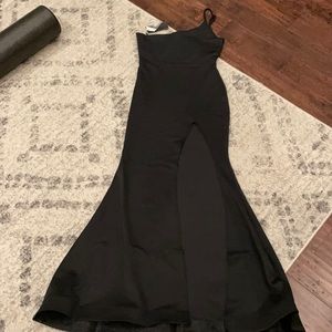 COPY - Miss Ord long black dress with slit.